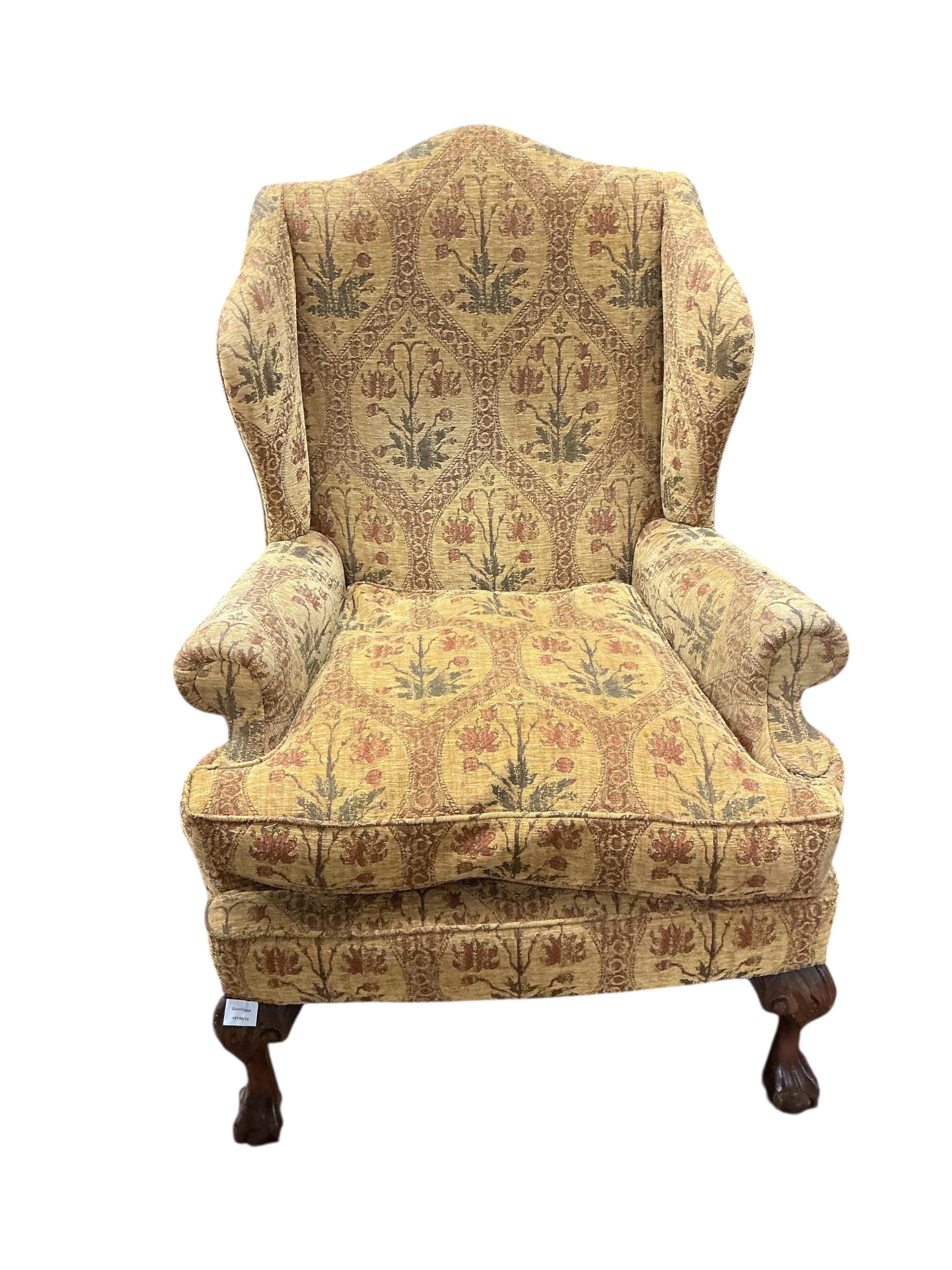 A pair of George III style upholstered wing armchairs, width 86cm, depth 74cm, height 120cm